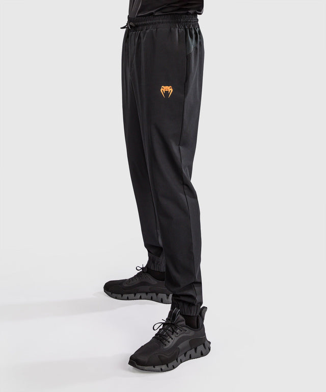 Spodnie joggerskie Venum G-Fit Revolution – Czarne/Miedziane