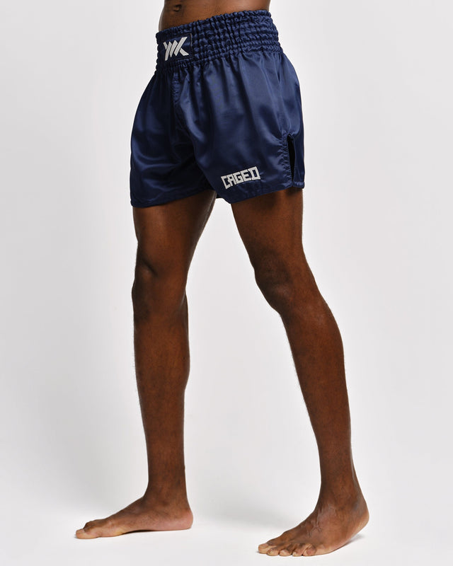 Pantaloncini Muay Thai Caged Classic – Blu navy/Bianco