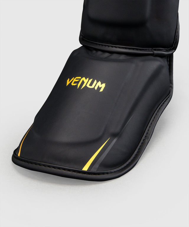 Venum Scheenbeschermers G-Core - Zwart/Goud