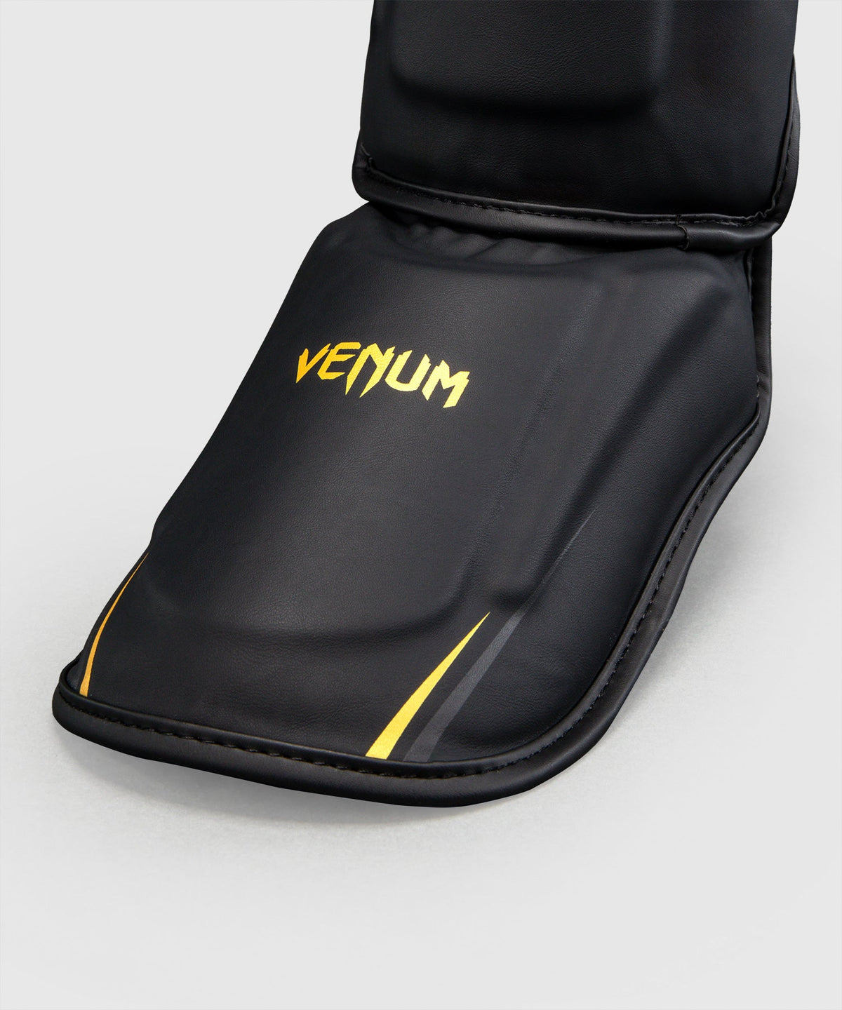 Venum Scheenbeschermers G-Core - Zwart/Goud
