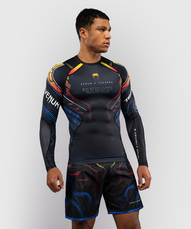 Venum Rashguard TEKKEN 8 Yoshimitsu – Schwarz/Orange – Foto 1