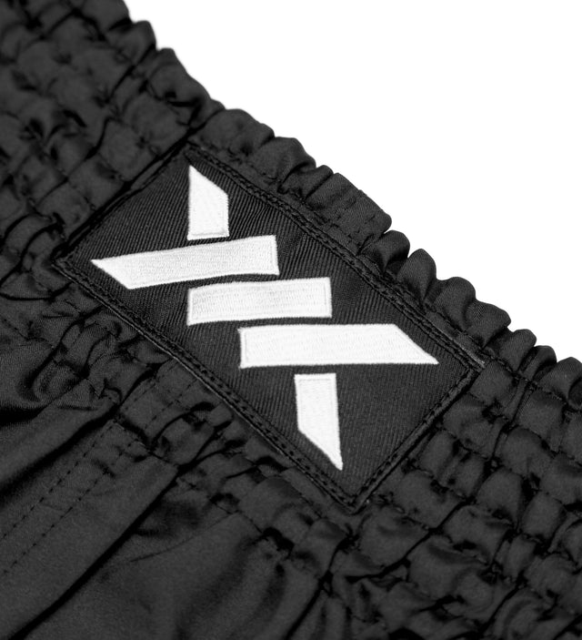 Shorts de Muay Thai Caged Classic – Noir/Blanc