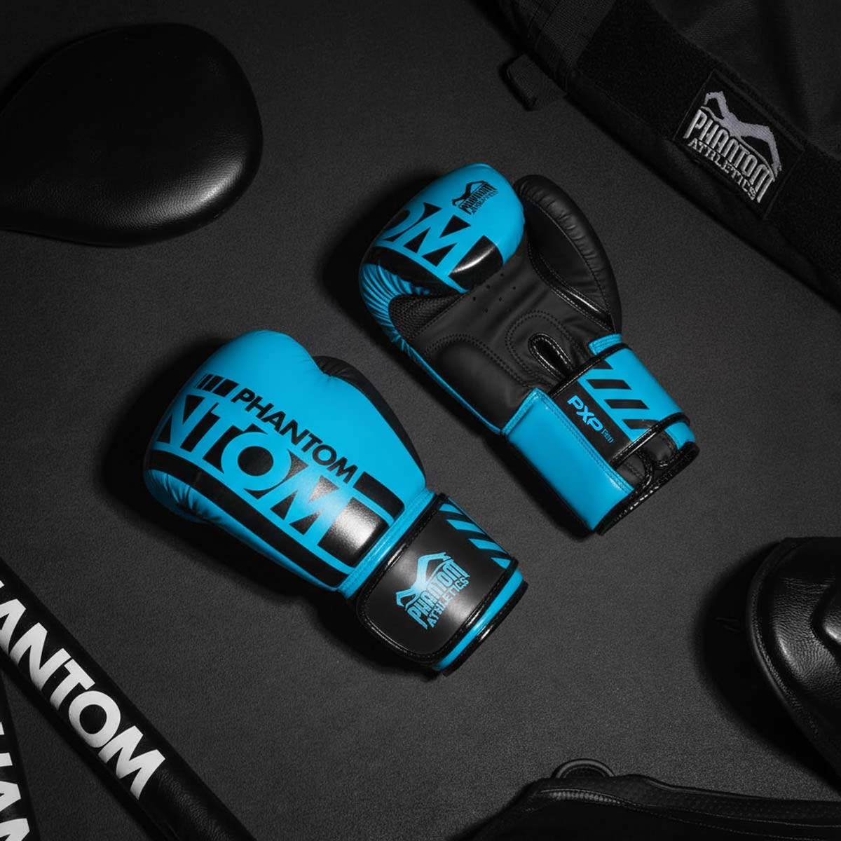 Rękawice bokserskie Phantom Athletics APEX – Neon Niebieski