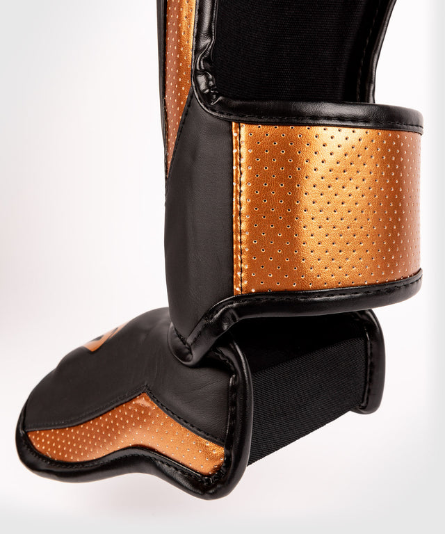 Protège-tibias Venum Elite Evo – Noir/Bronze