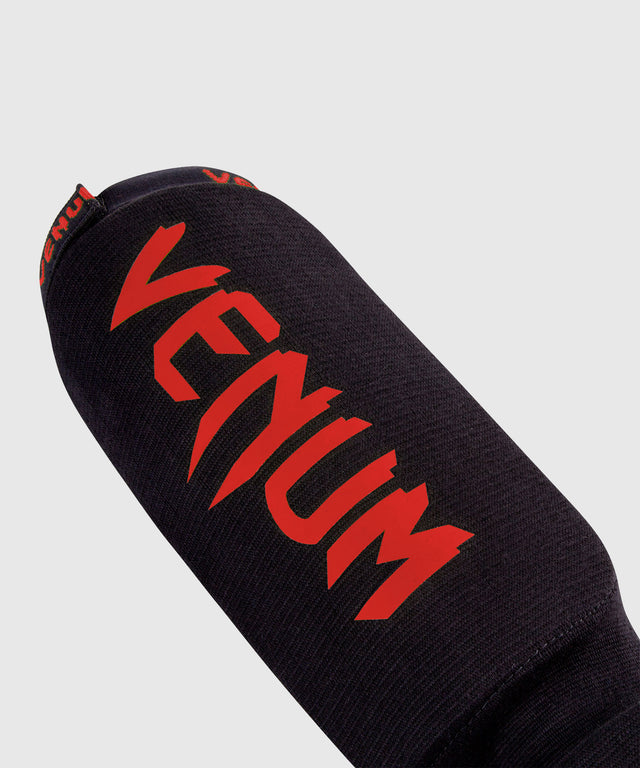 Protège-tibias Venum Kontact – Noir/Rouge