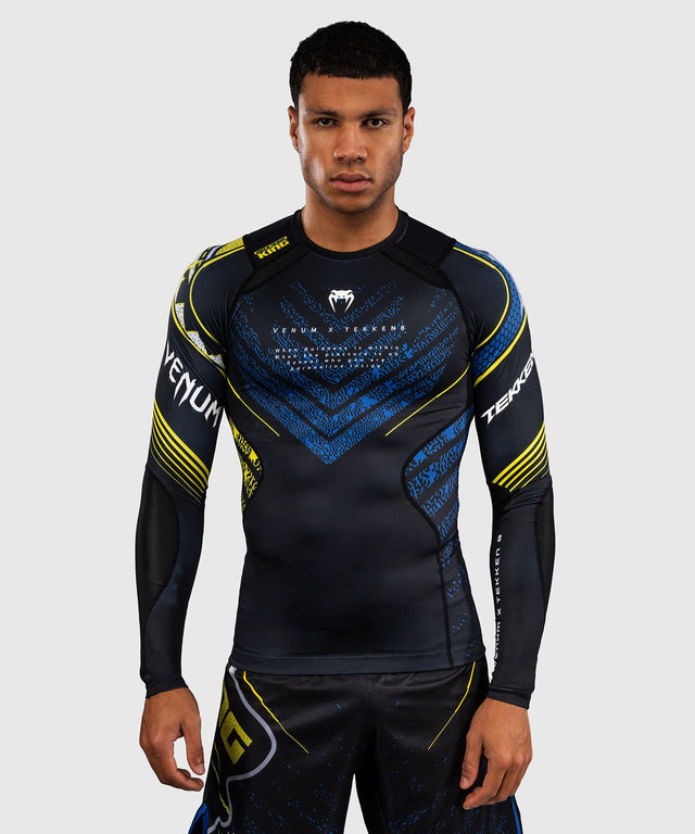 Venum Rashguard TEKKEN 8 King – Schwarz/Gelb – Foto 1