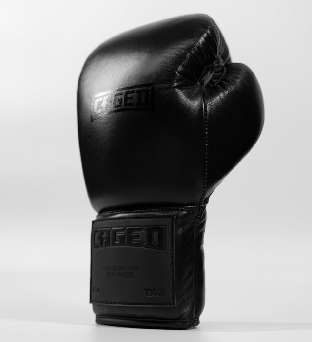 Guantes de boxeo Caged X Series con cordones – Negro/Negro