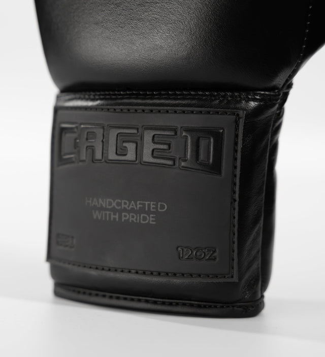 Guantes de boxeo Caged X Series con cordones – Negro/Negro