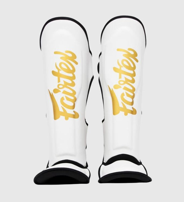 Ochraniacze na piszczele Fairtex Kickboks FXB – Biały/Złoty – Ochraniacze na piszczele