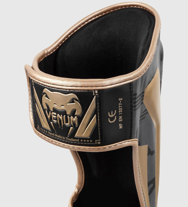 Paratibie da kickboxing Venum Elite – Camo Grigio/Oro – Paratibie