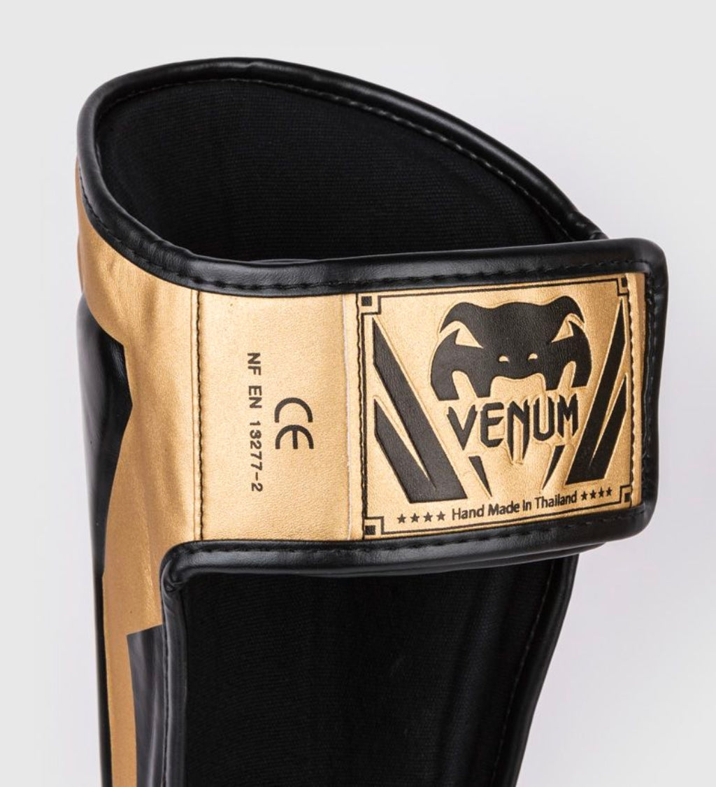 Venum Kickboks Scheenbeschermers Elite - Goud/Zwart - Scheenbeschermers