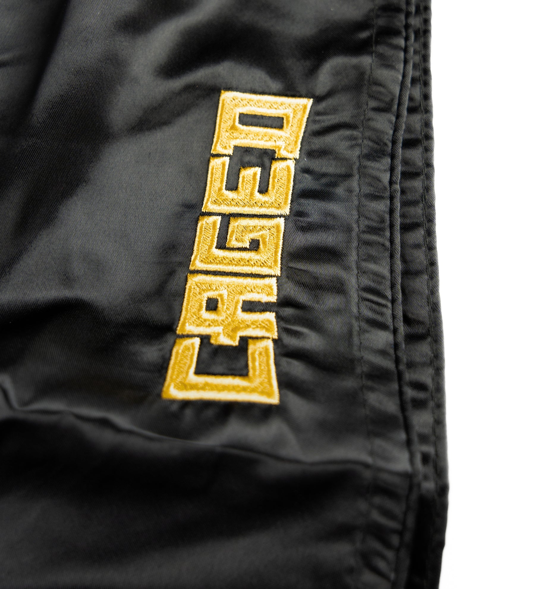 Caged Muay Thai Shorts Shadow - Zwart/Goud