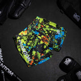 Phantom Athletics MMA-Shorts Fusion Splatter – Schwarz/Neon