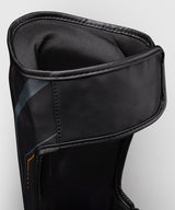 Venum Scheenbeschermers Streamline - Zwart/Goud