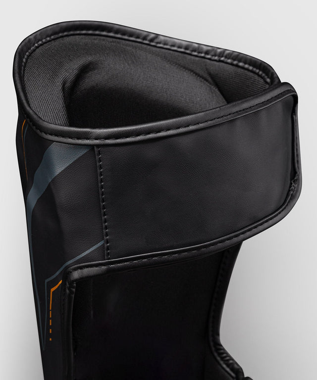 Venum Streamline Shin guards – Black/Gold