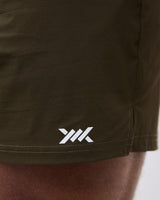 Caged Essential training shorts - Leger Groen