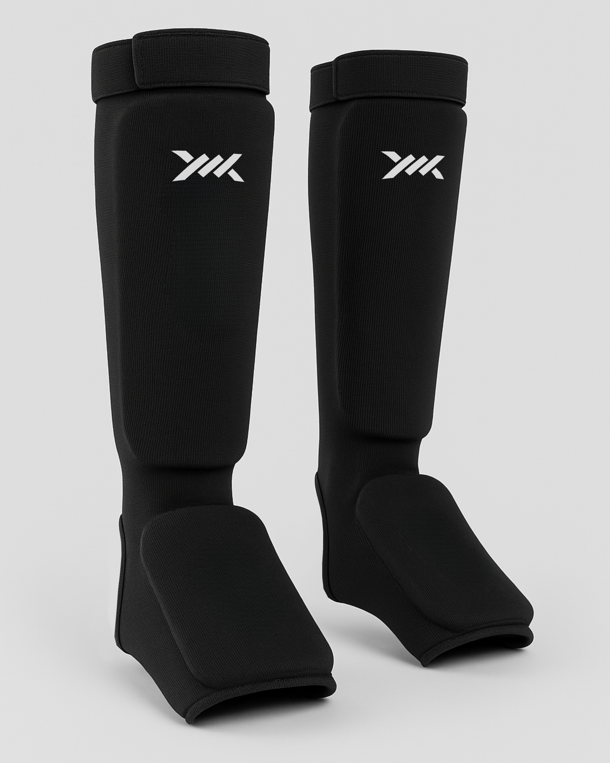 Caged Scheenbeschermers Core - Zwart/Wit