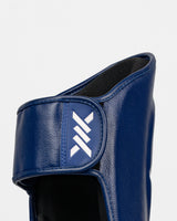 Caged Scheenbeschermers 'X' Series - Navy Blauw/Wit