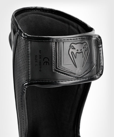 Tibiere Venum Elite Evo – Negru/Negru