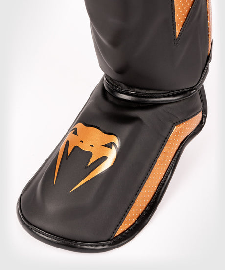Venum Skinnebensbeskyttere Kickboxing Elite Evo – Sort/Bronze