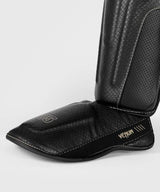 Venum Kickboks Scheenbeschermers Impact Evo Scales - Zwart