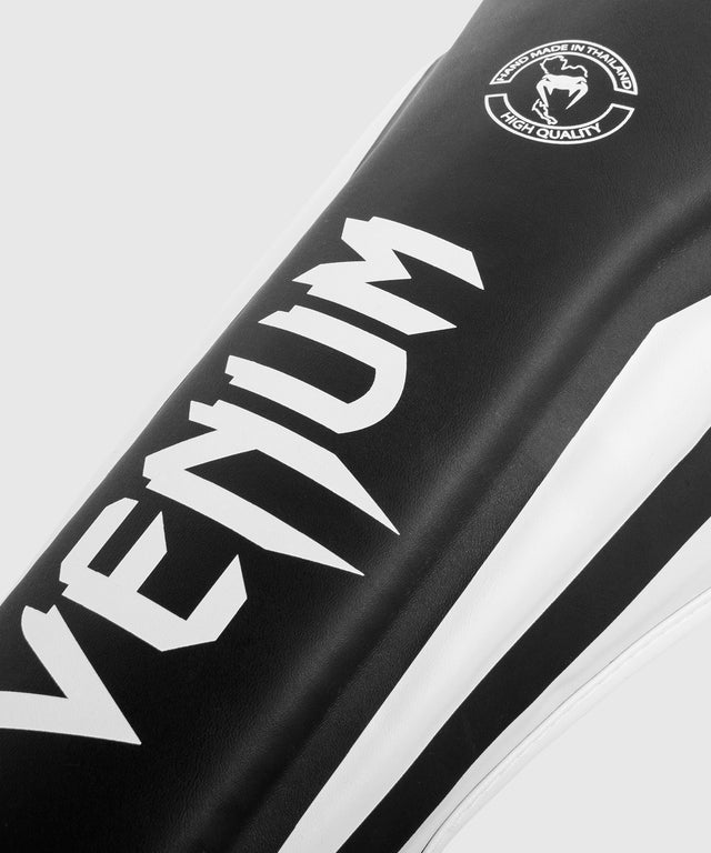 Protège-tibias Venum Elite – Noir/Blanc