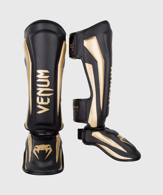 Tibiere Venum Elite – Negru/Auriu
