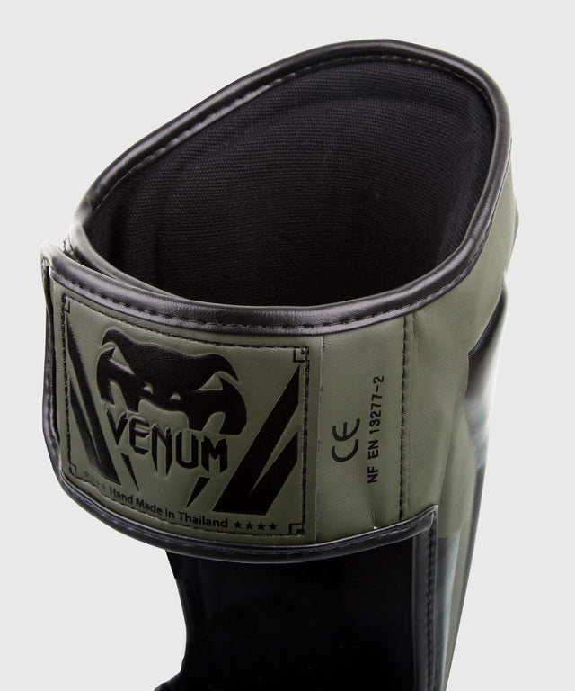 Venum Schienbeinschoner Elite – Grün/Schwarz