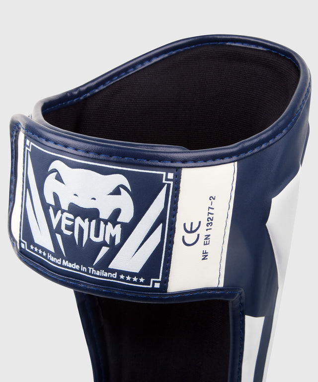Protège-tibias Venum Elite – Bleu marine/Blanc