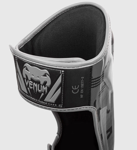 Espinilleras Venum Elite – Camo Gris