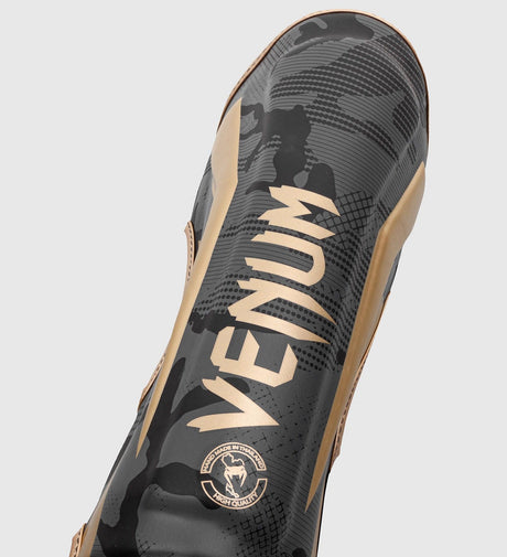 Venum Kickboks Scheenbeschermers Elite - Camo Grijs/Goud - Scheenbeschermers