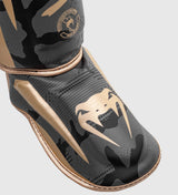 Venum Kickboks Scheenbeschermers Elite - Camo Grijs/Goud - Scheenbeschermers