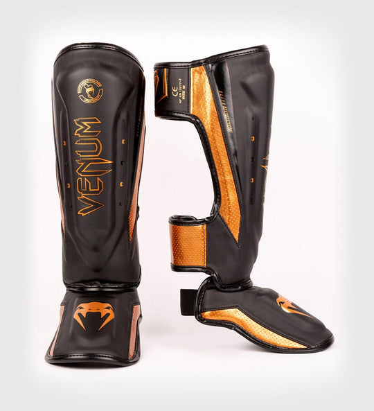 Venum Kickboks Scheenbeschermers Elite Evo - Zwart/Brons